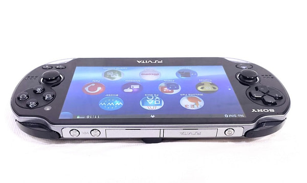 Sony PlayStation Vita PCH-1100 (Wi-Fi + 3G, OLED, Crystal Black) Electronics